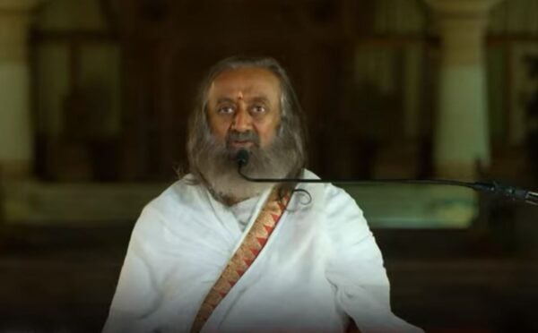 Photo shows Gurudev Sri Sri Ravi Shankar speaking on the Kindness With Amy podcast