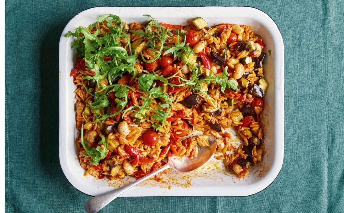 a picture of a tray bake with roasted pepper, thyme, and butter beans