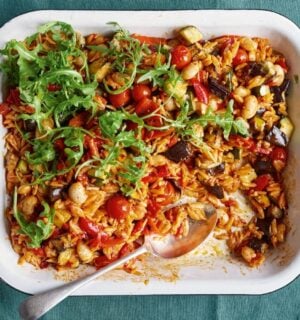 a picture of a tray bake with roasted pepper, thyme, and butter beans