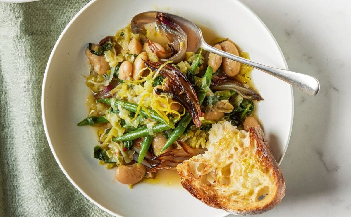 A bowl of roasted shallot and butter bean stew