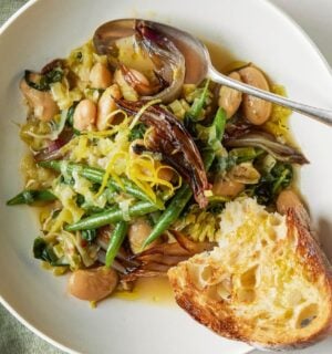 A bowl of roasted shallot and butter bean stew