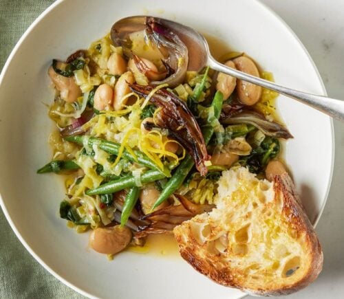 A bowl of roasted shallot and butter bean stew