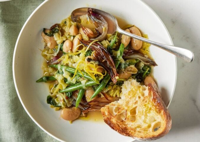 A bowl of roasted shallot and butter bean stew