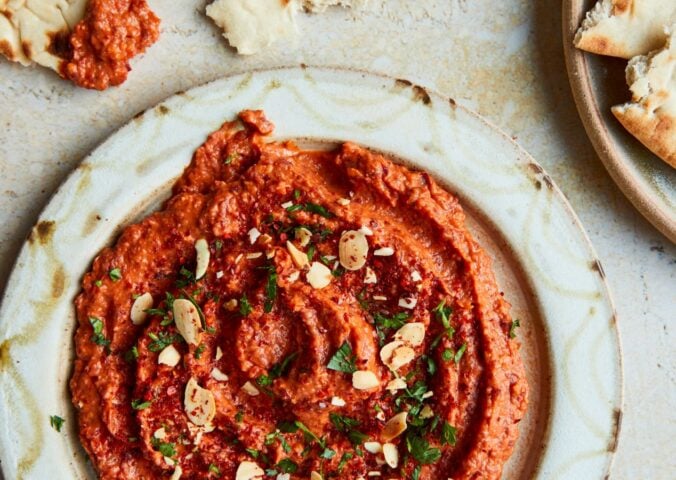 a picture of vibrant and smoky kidney bean dip made with canned red peppers and sun-dried tomatoes