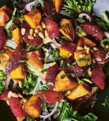 a picture of a vibrant sweet potato and blood orange salad with mustard vinaigrette