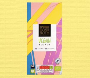 The Moser Roth vegan blonde Aldi chocolate bar in front of a pale yellow background