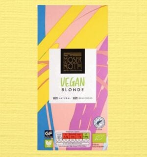 The Moser Roth vegan blonde Aldi chocolate bar in front of a pale yellow background