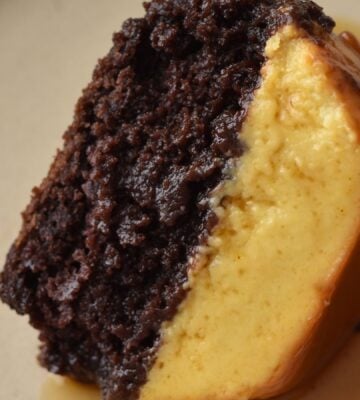 A picture of a slice of vegan chocoflan made with silken tofu and box cake mix