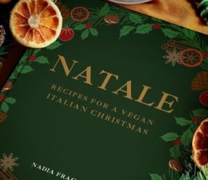 A close up shot of the cover of NATALE: Recipes for a Vegan Italian Christmas, a vegan cookbook