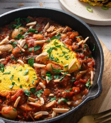 vegan shakshuka made with tofu egg and butter beans in a rich tomato sauce