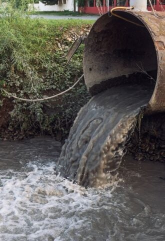 sewage discharge into river