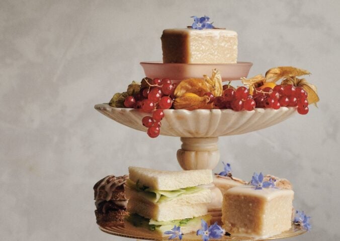 a picture of almond tea cakes made with marzipan, apricot jam, and topped with flowers