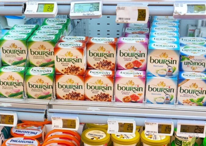 Photo shows a selection of Bel Group's Boursin cheese on a refrigerated supermarket shelf