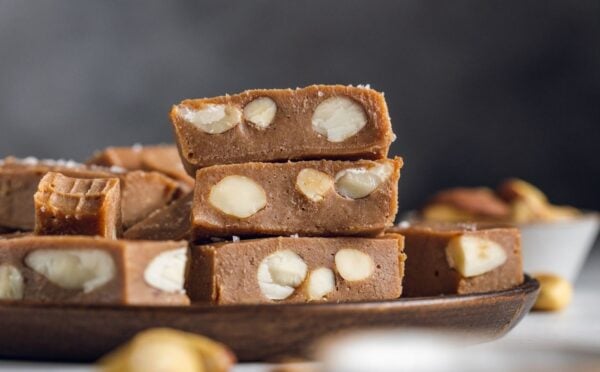 pieces of Brazil nut fudge filled with whole Brazil nuts and made with cacao and maple syrup