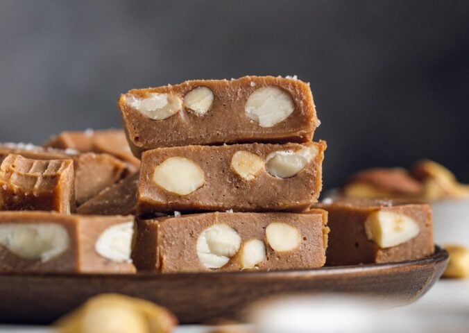 pieces of Brazil nut fudge filled with whole Brazil nuts and made with cacao and maple syrup