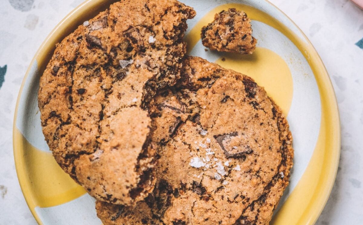 a picture of a chocolate chunk cookie topped with sea salt