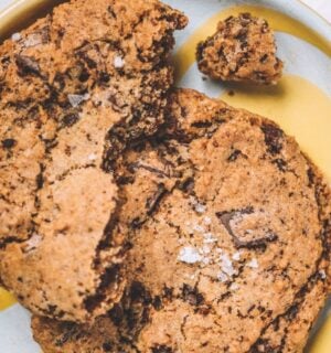 a picture of a chocolate chunk cookie topped with sea salt