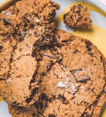 a picture of a chocolate chunk cookie topped with sea salt