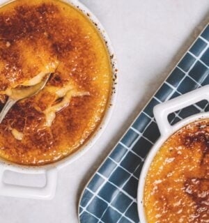 a picture of freshly-made vegan creme brulees topped with torched sugar