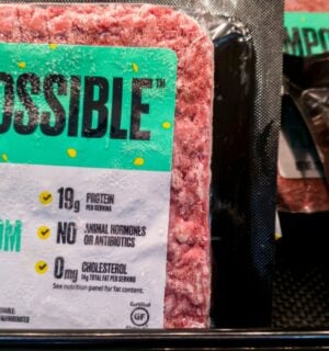 Some Impossible Foods burgers on a supermarket shelf