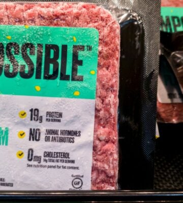 Some Impossible Foods burgers on a supermarket shelf