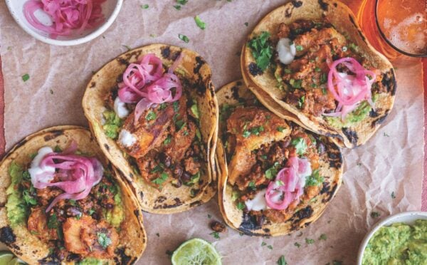 a picture of plantain and black bean tacos made with charred poblano sauce