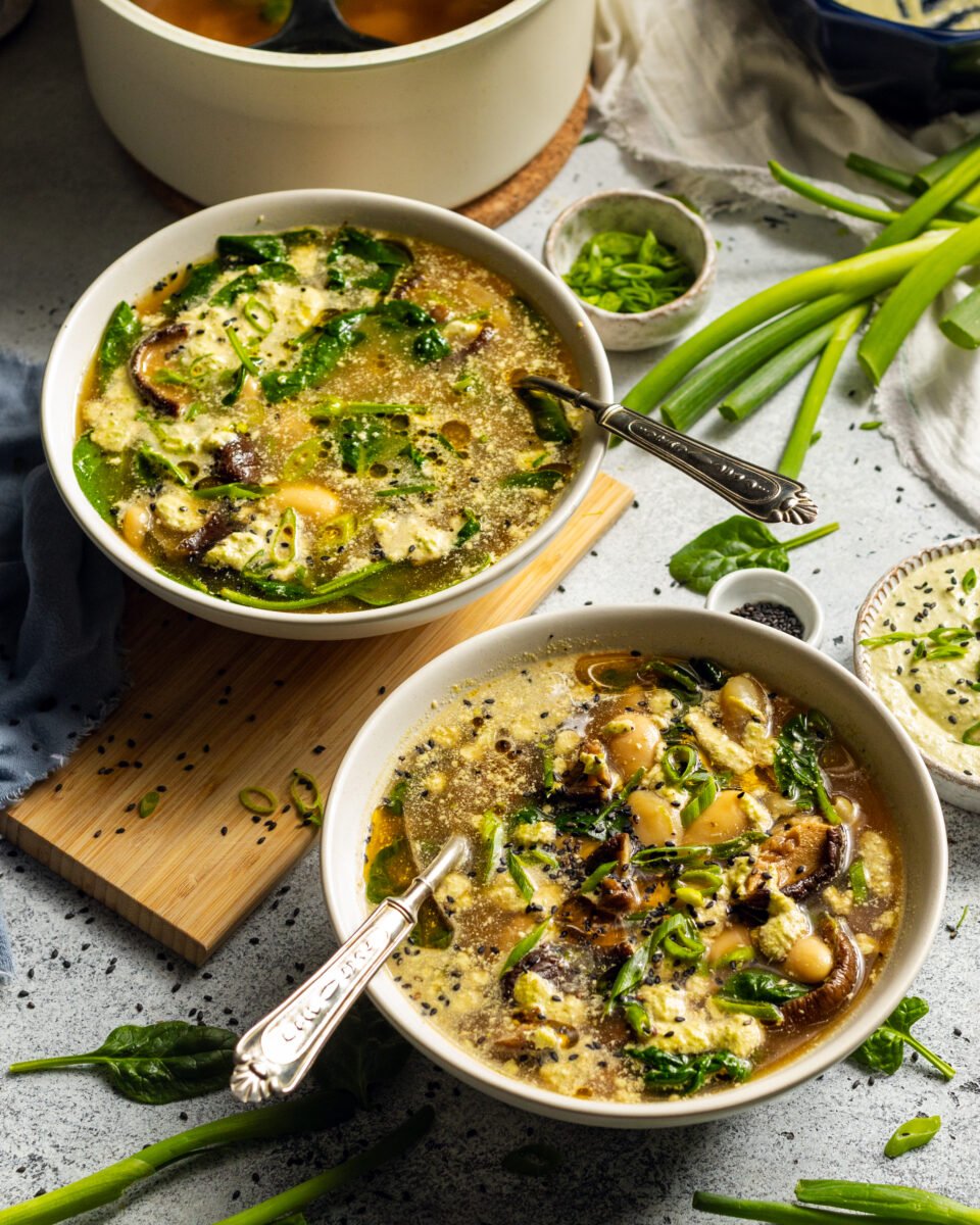 Two bowls of miso butter bean soup, a warming vegan soup recipe