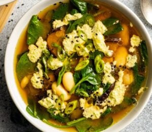 Two bowls of miso butter bean soup, a warming vegan soup recipe