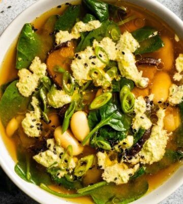 Two bowls of miso butter bean soup, a warming vegan soup recipe