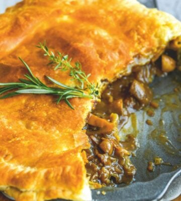 a mushroom and Guinness pie made with vegan puff pastry, cremini mushrooms, Guinness and seasonings