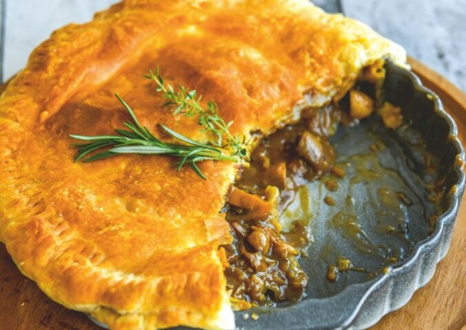 a mushroom and Guinness pie made with vegan puff pastry, cremini mushrooms, Guinness and seasonings