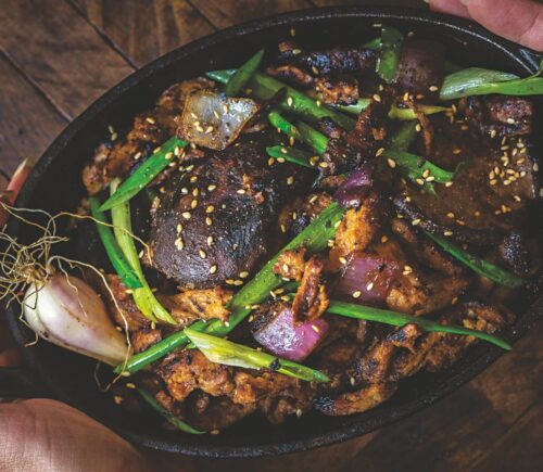 a picture of Korean mushroom bulgogi made with soy curls and shiitake mushrooms