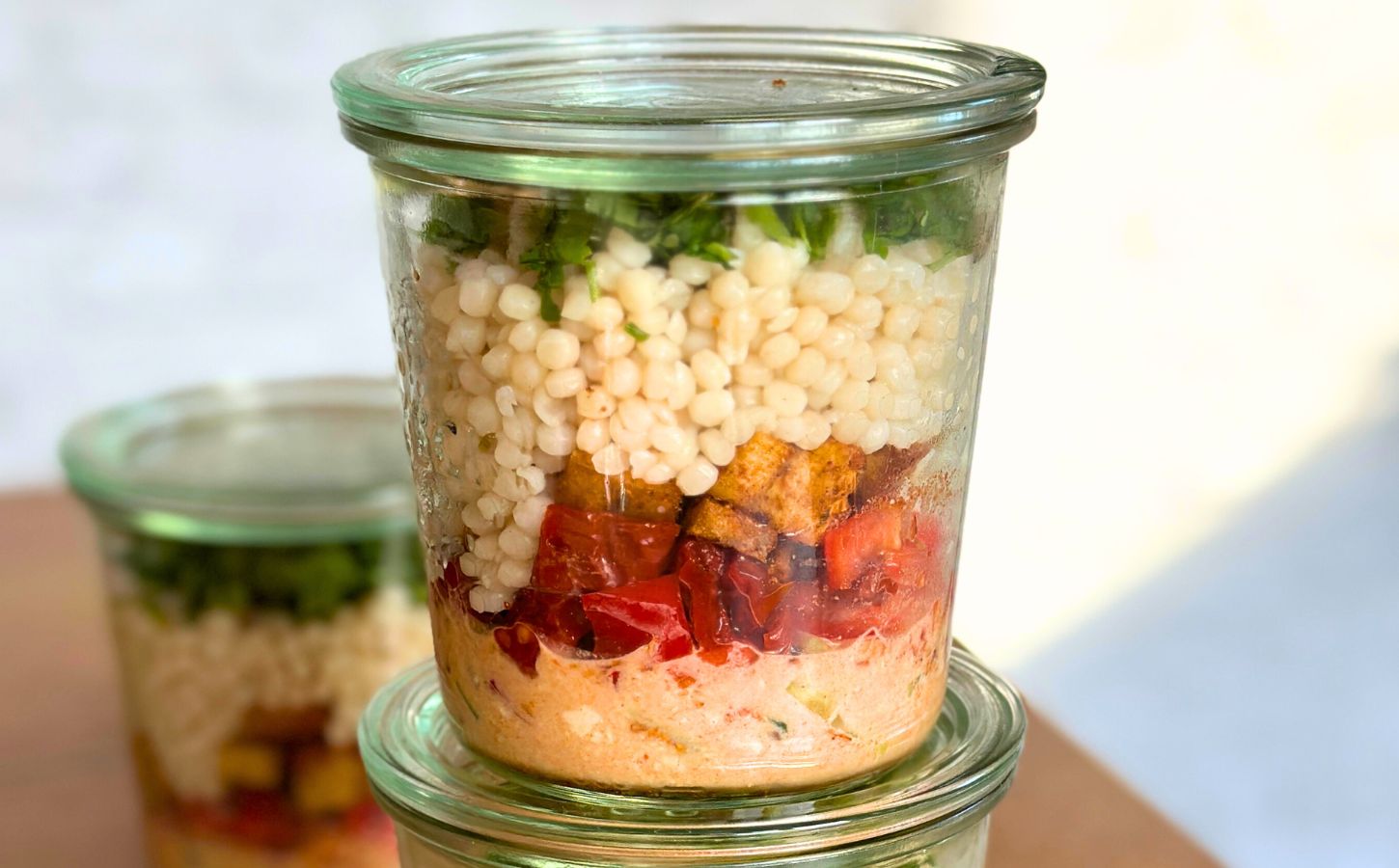 A jarred couscous salad, a vegan office packed lunch idea