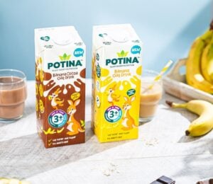 Photo shows both flavors of the new Potina drink on a table with a glass and several bananas