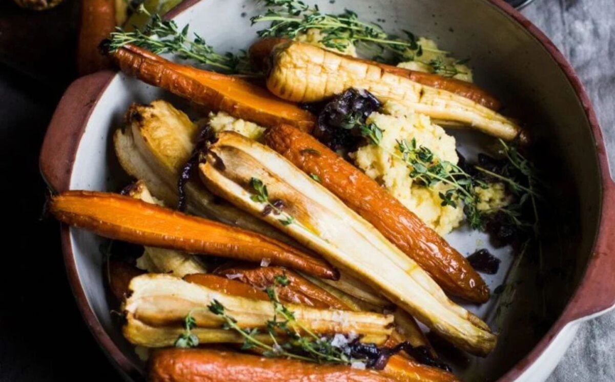 a picture of spiced maple roast carrots and parsnips with mustard polenta mash, a recipe using in-season vegetables for fall