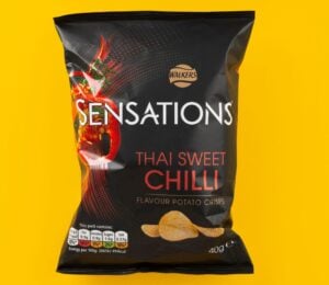 A packet of Thai Sweet Chilli Sensations in front of a yellow background