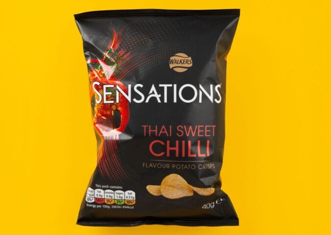 A packet of Thai Sweet Chilli Sensations in front of a yellow background