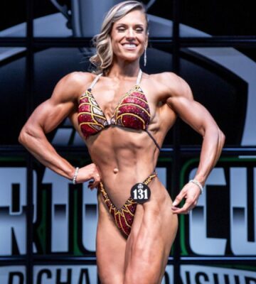 Vegan bodybuilder Maddie McConnell competing stage in a bikini
