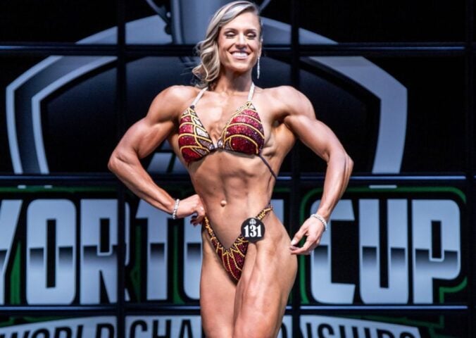 Vegan bodybuilder Maddie McConnell competing stage in a bikini