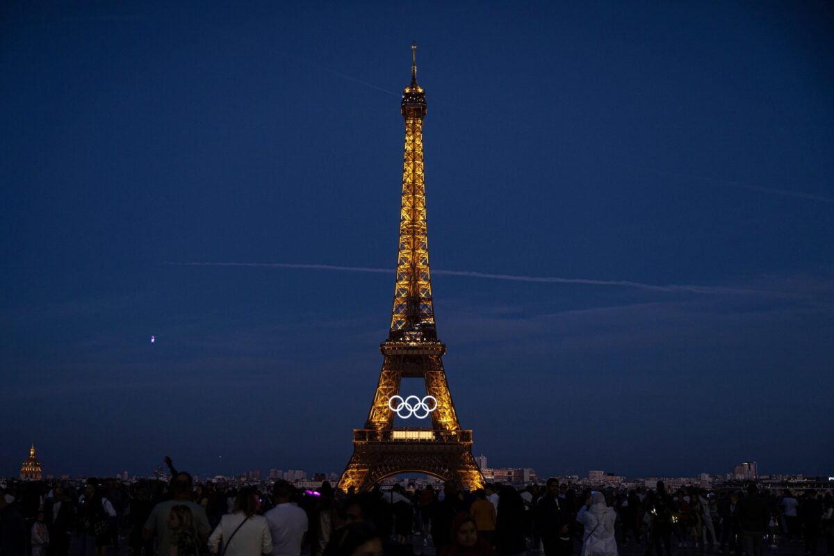 The eiffel tower lit up with the Olympics sign during the Paris Olympics