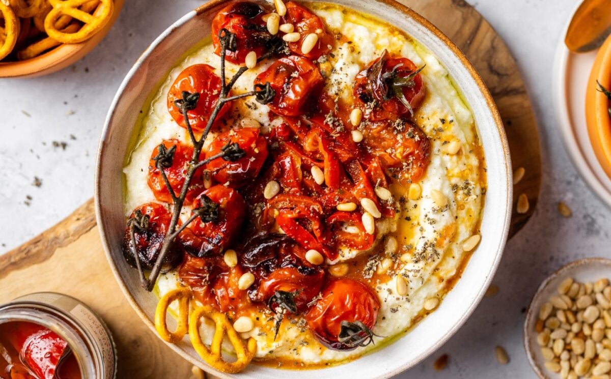 A vegan whipped feta dish with slow-roasted tomatoes