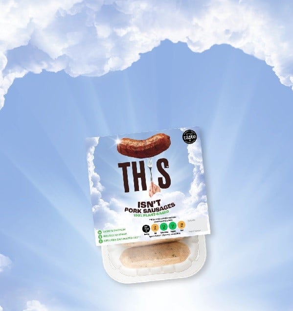 Photo shows the updated THIS logo on a packet of plant-based sausages against a new background image of blue sky and clouds