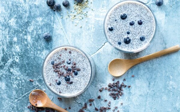 two bowls of blueberries and cream chia pudding