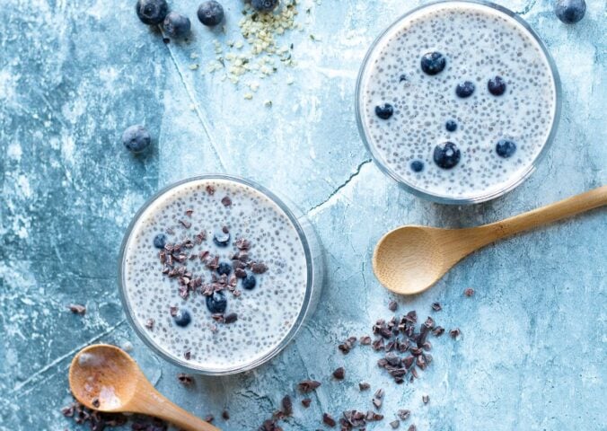 two bowls of blueberries and cream chia pudding