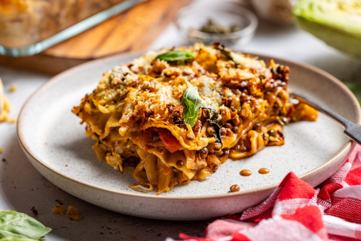 a slice of cabbage and walnut lasagna on a plate