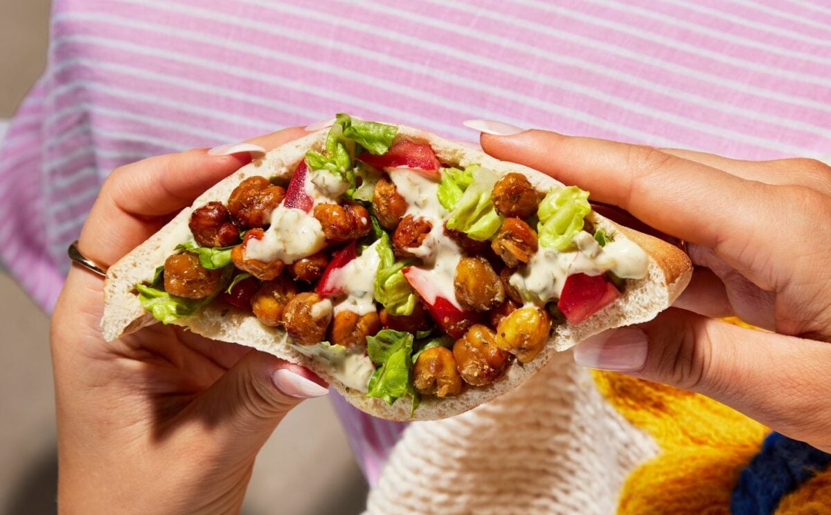 a picture of one of the portable and vegan Caesar chickpea pitta pockets