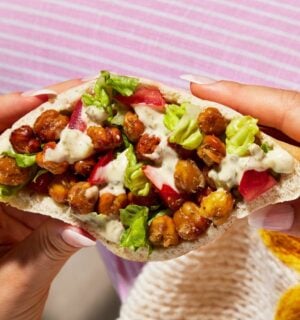 a picture of one of the portable and vegan Caesar chickpea pitta pockets