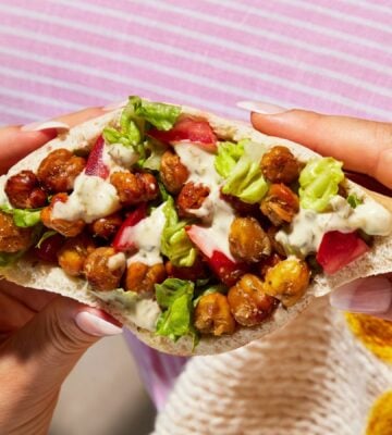 a picture of one of the portable and vegan Caesar chickpea pitta pockets