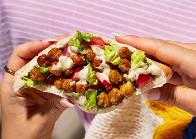 a picture of one of the portable and vegan Caesar chickpea pitta pockets