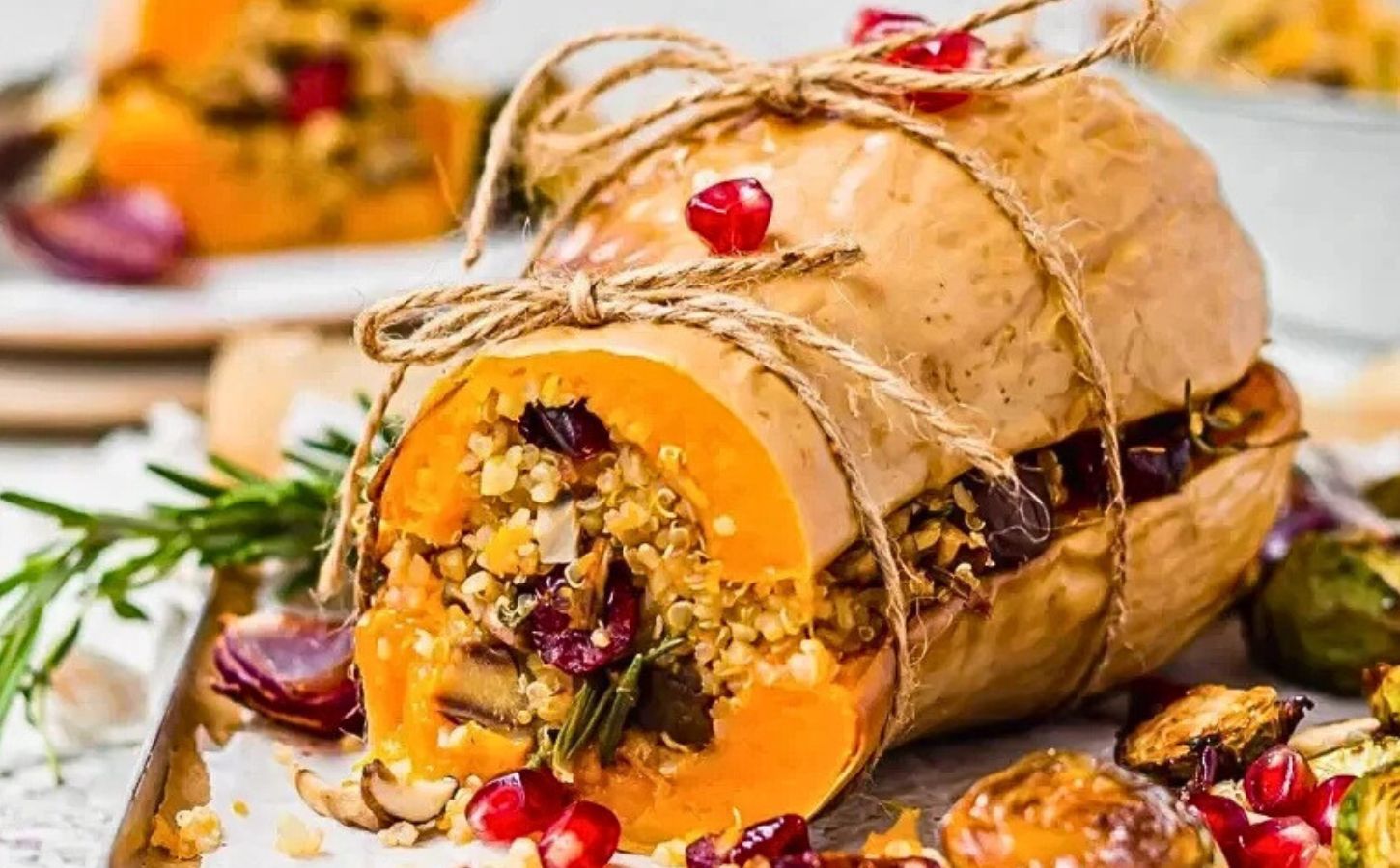 Vegan chestnut and cranberry-stuffed squash, part of vegan centerpieces to serve at your dinner party